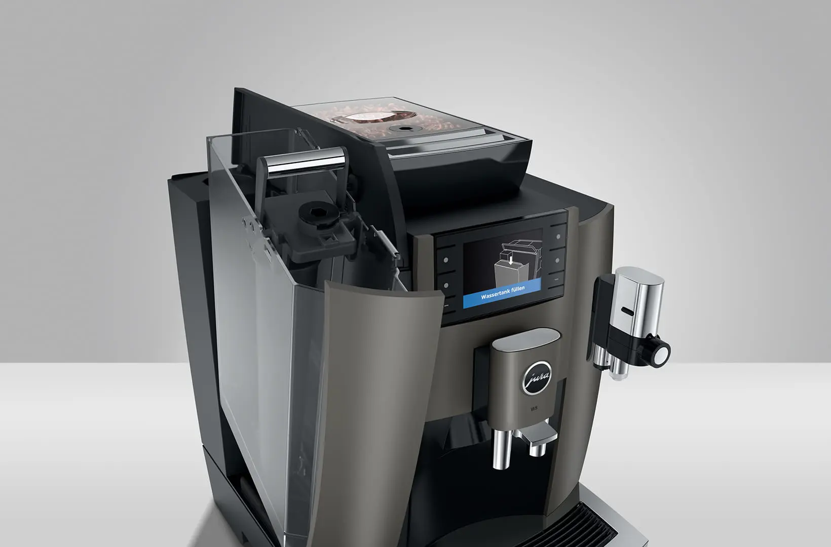 Vue éclatée de la JURA W8 Dark Inox montrant le grand réservoir d'eau amovible et le bac à grains, mettant en avant l'entretien facile pour un usage professionnel.